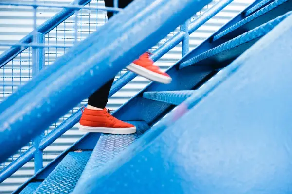 Picture of somebody running up stairs.